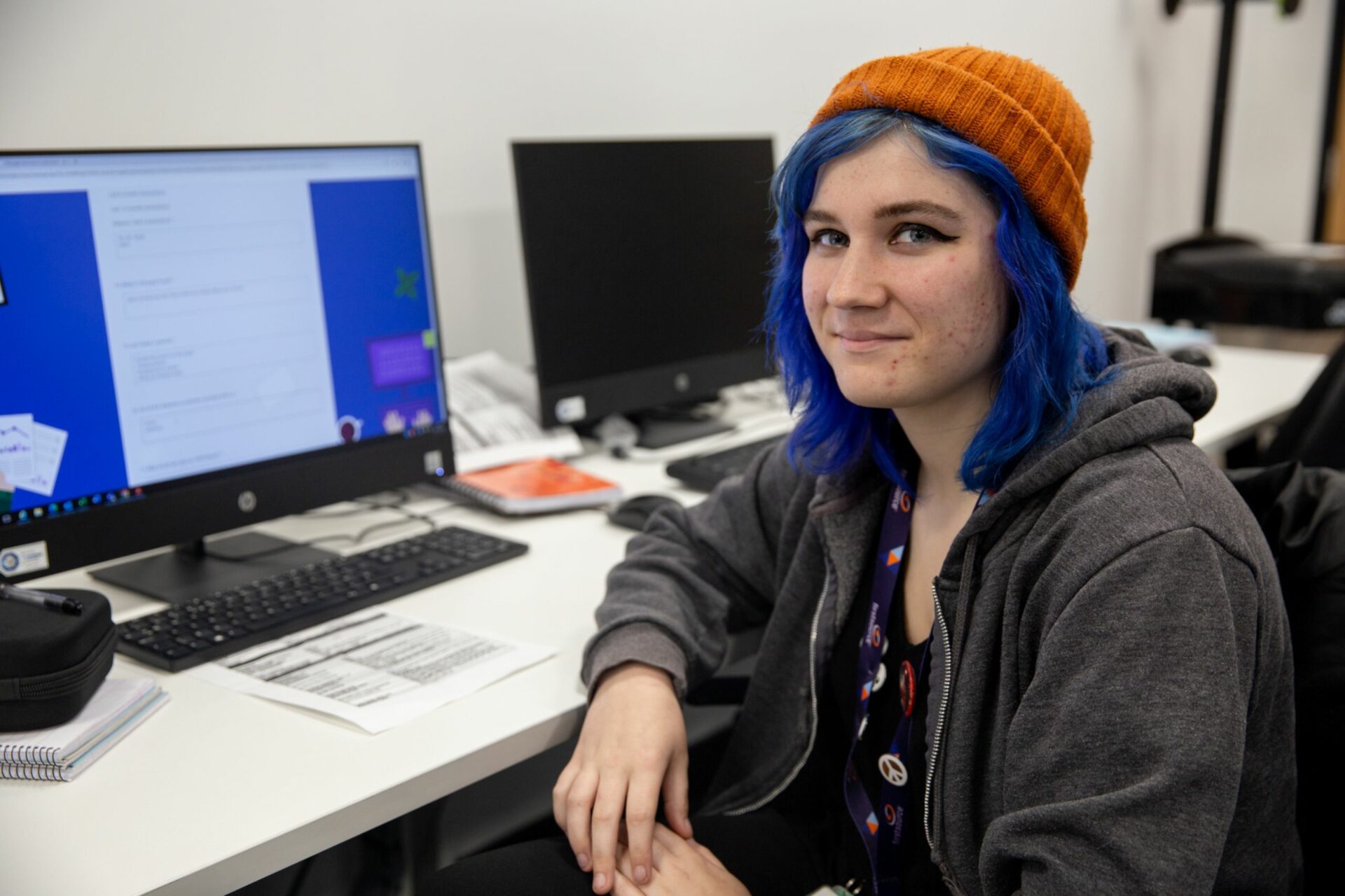 Apprentice sitting at a computer