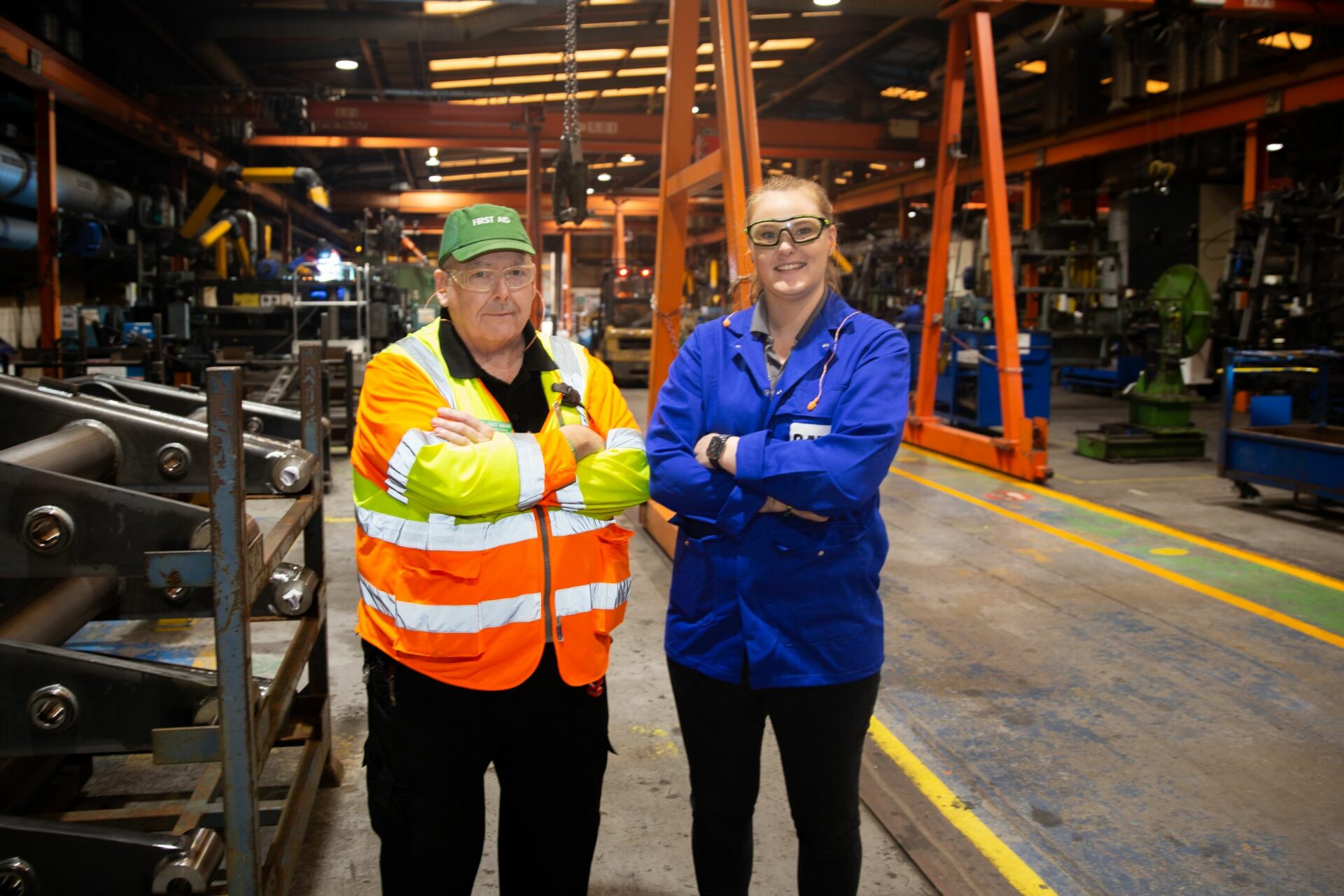 Employer and apprentice in workshop