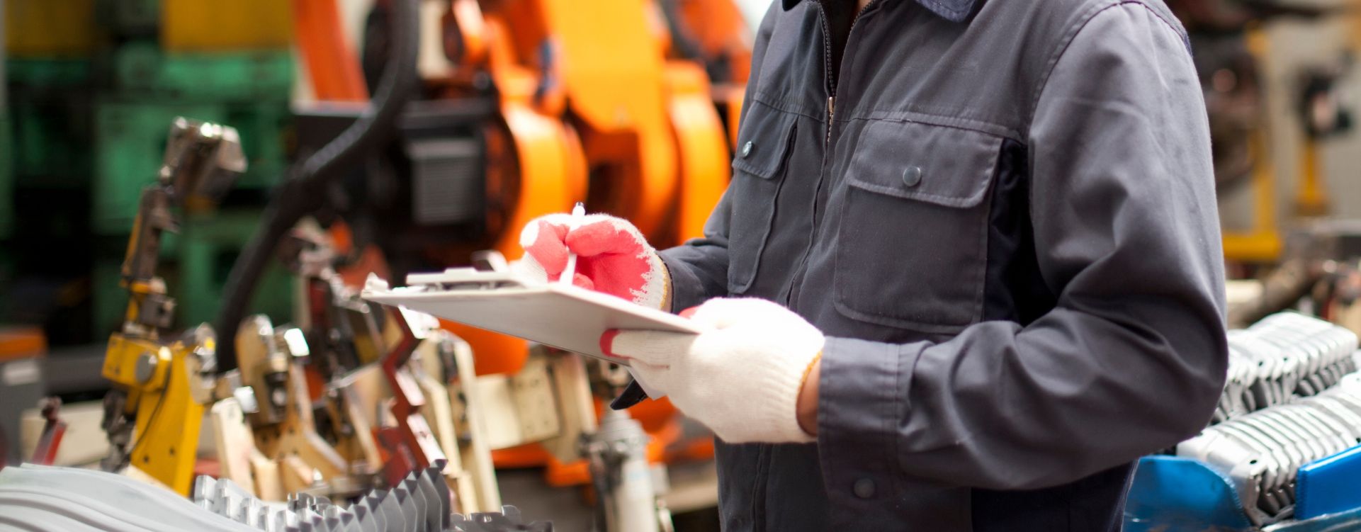 Hands writing in clipboard