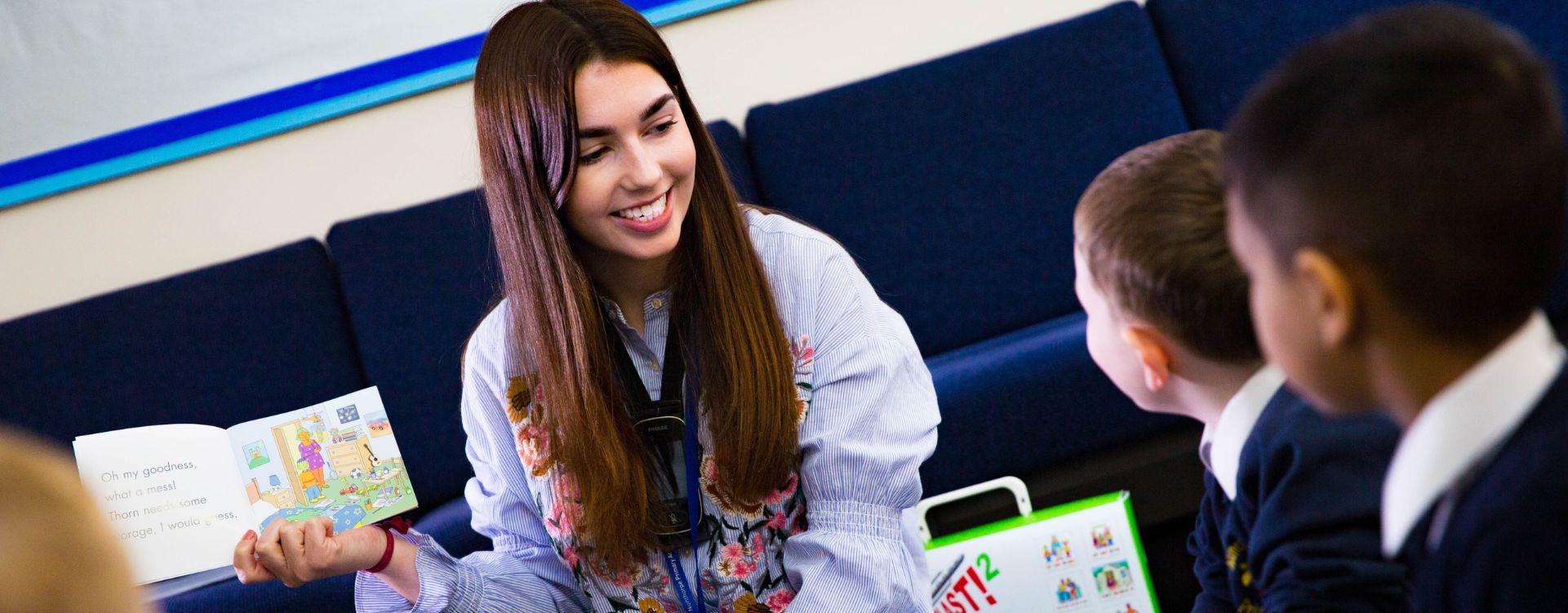 Teacher reading to children