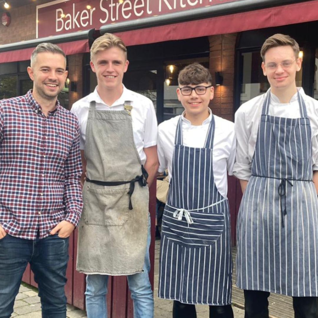 Simon Fletcher and apprentices outside Baker Street Kitchen
