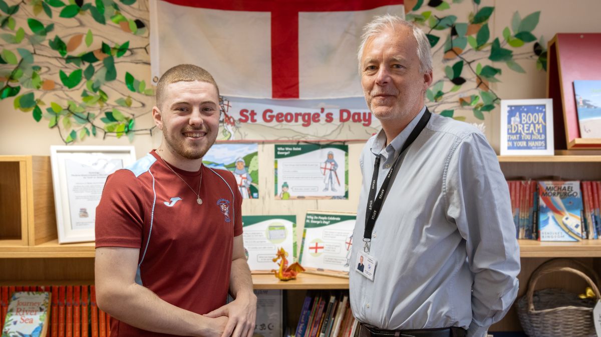 Education apprentice with employer in classroom