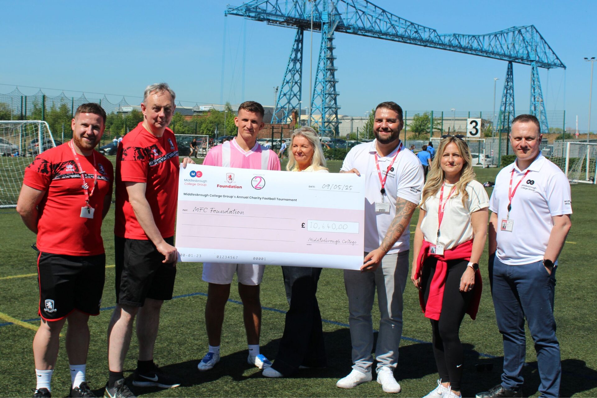 MFC Foundation and Northern Skills team holding cheque